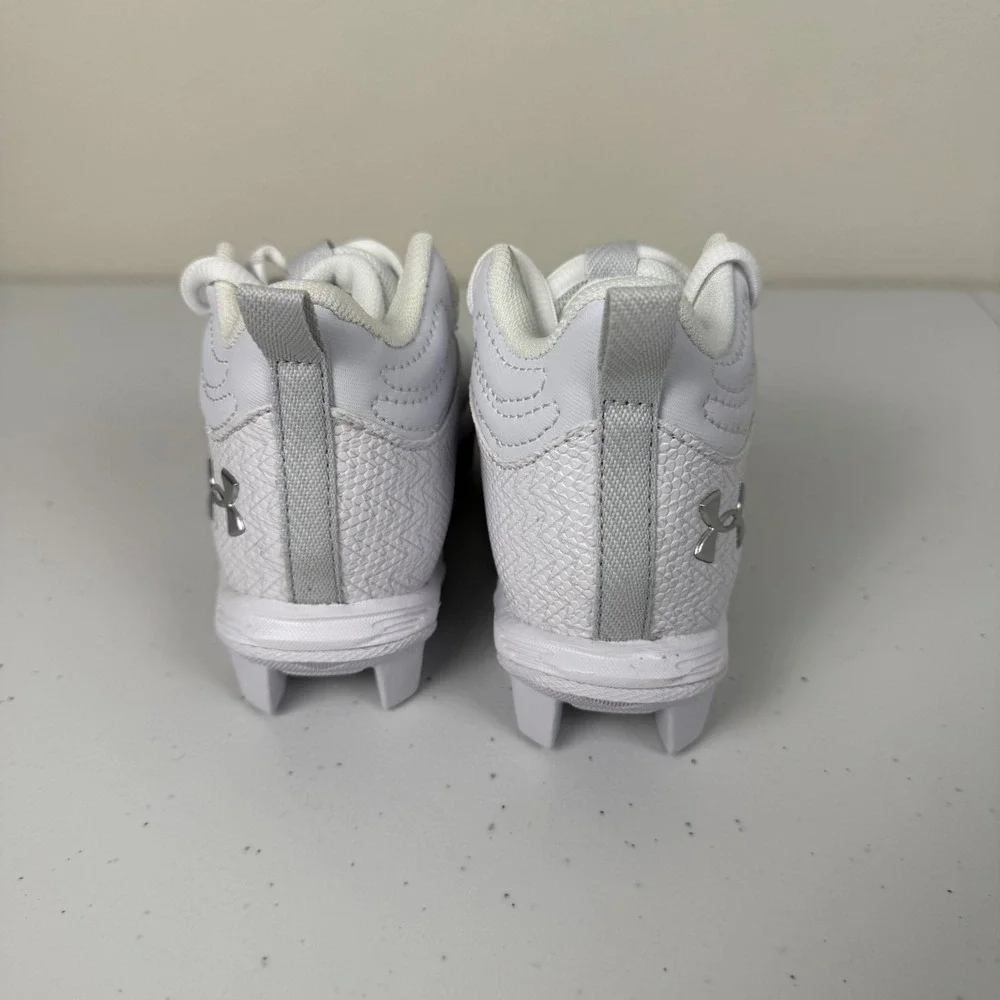 Under Armour White Kids Cleat Sneakers with Silver Logo